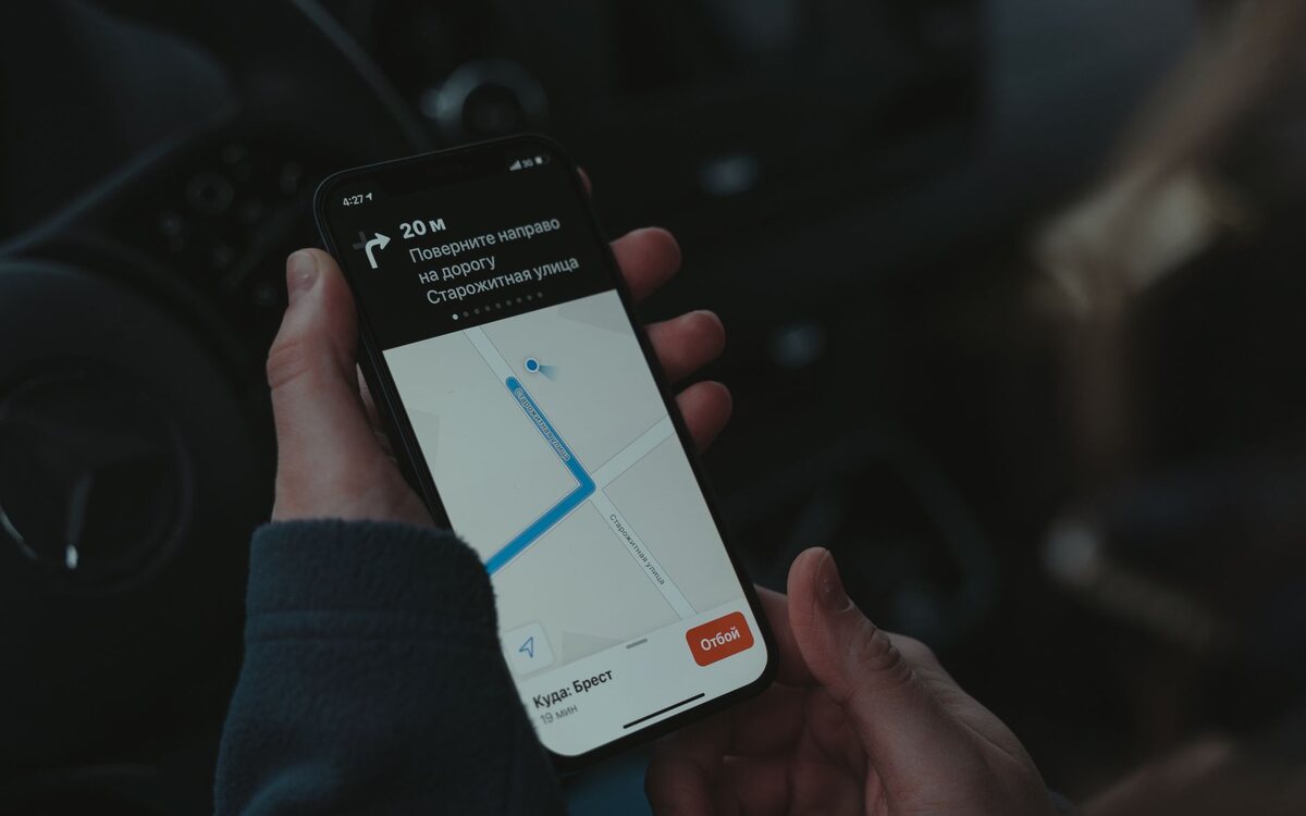 Person using a phone map to find their way